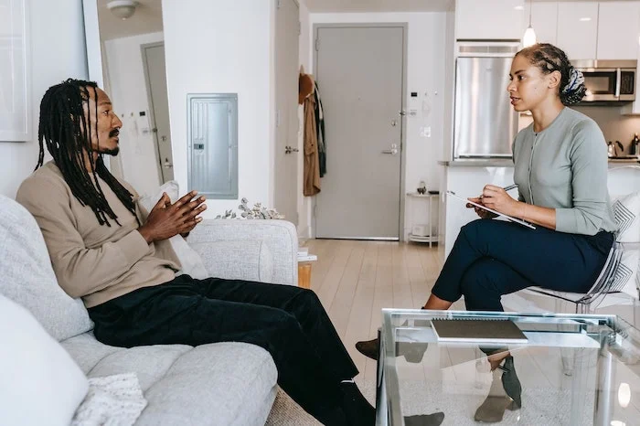 A man in a one to one therapy session at a drug & alcohol rehab centre in Cambridgeshire