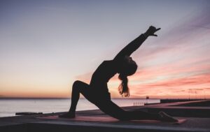 A woman practicing yoga in Luton