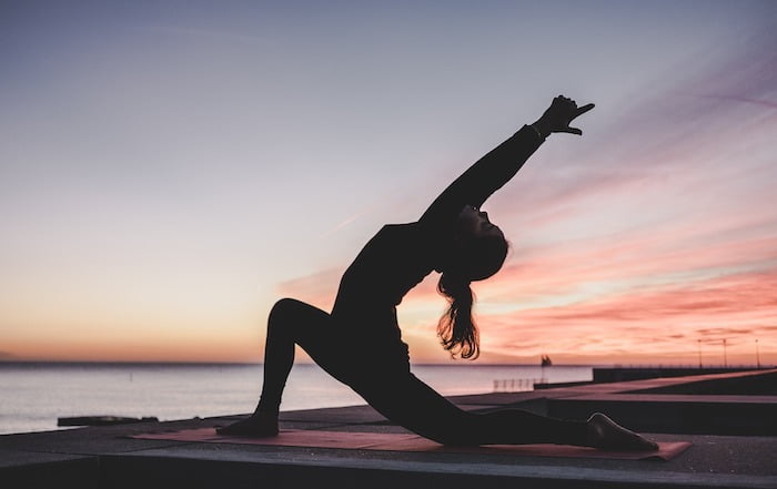 A woman practicing yoga