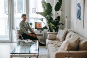 A woman sitting in her front room in Northamptonshire