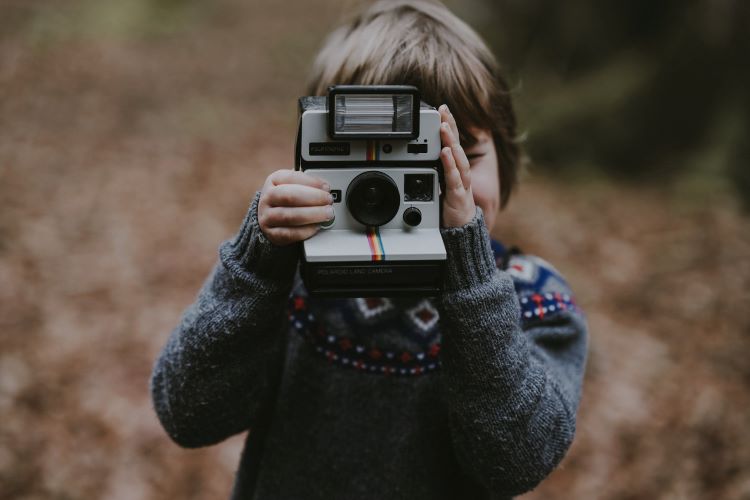 A child taking a photo