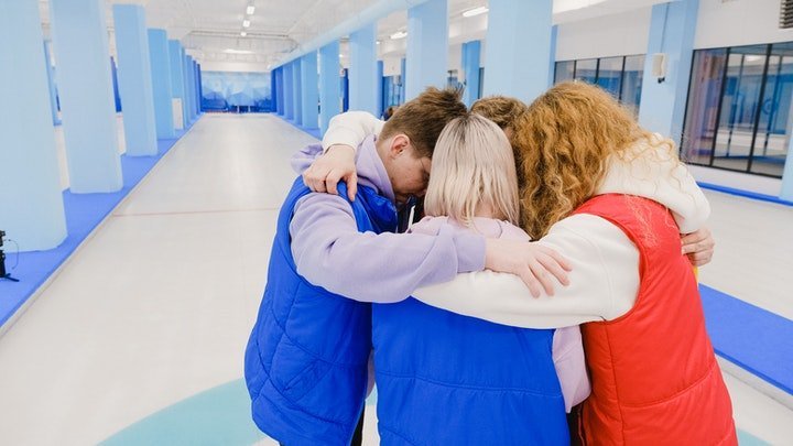 Group of patients leaning on each other at a drug and alcohol rehab clinic in Hereford