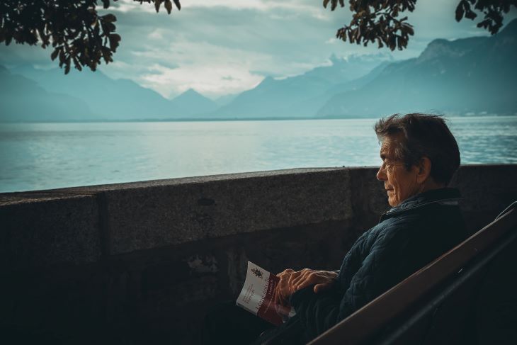 man reading book