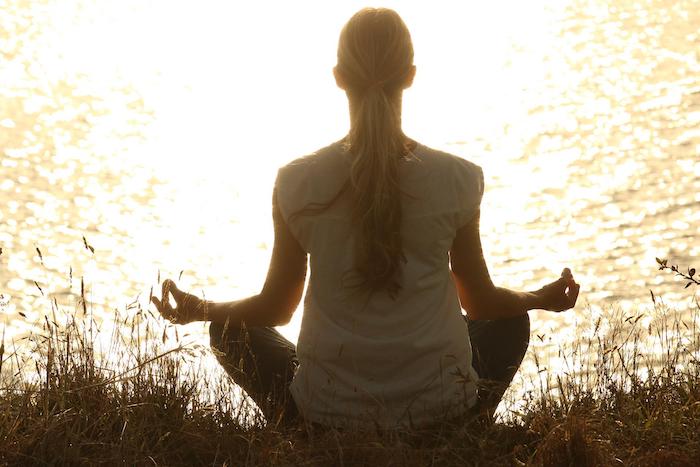 Patient meditating outside at a drug and alcohol rehab centre in Gloucester