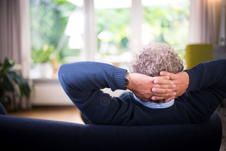 A man waiting in a chair