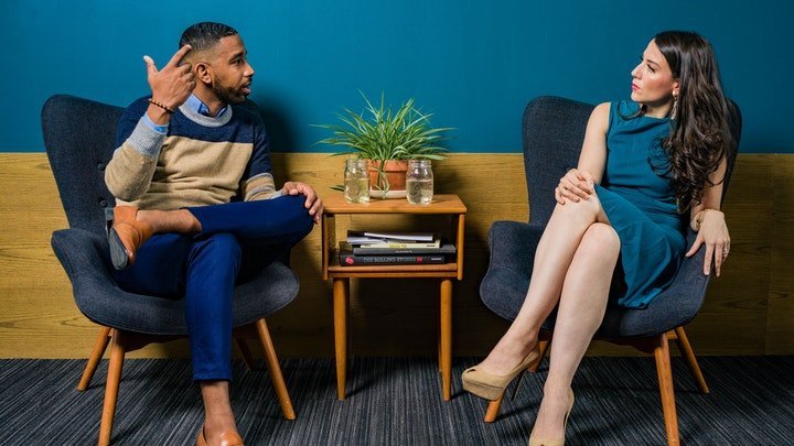 Therapist and patient sat together talking at a drug and alcohol rehab clinic in Gloucestershire