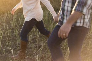 Two people walking together and discussing drug & alcohol addiction treatment in Bristol