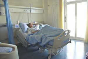 A woman in hospital bed