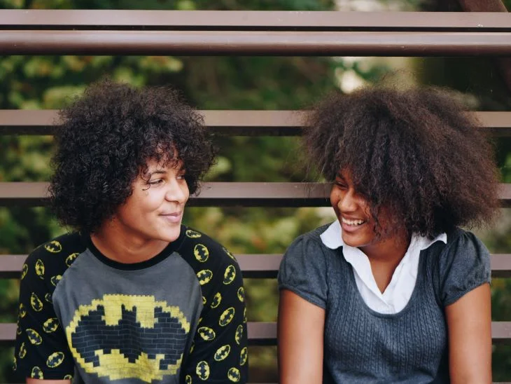 Two women smiling