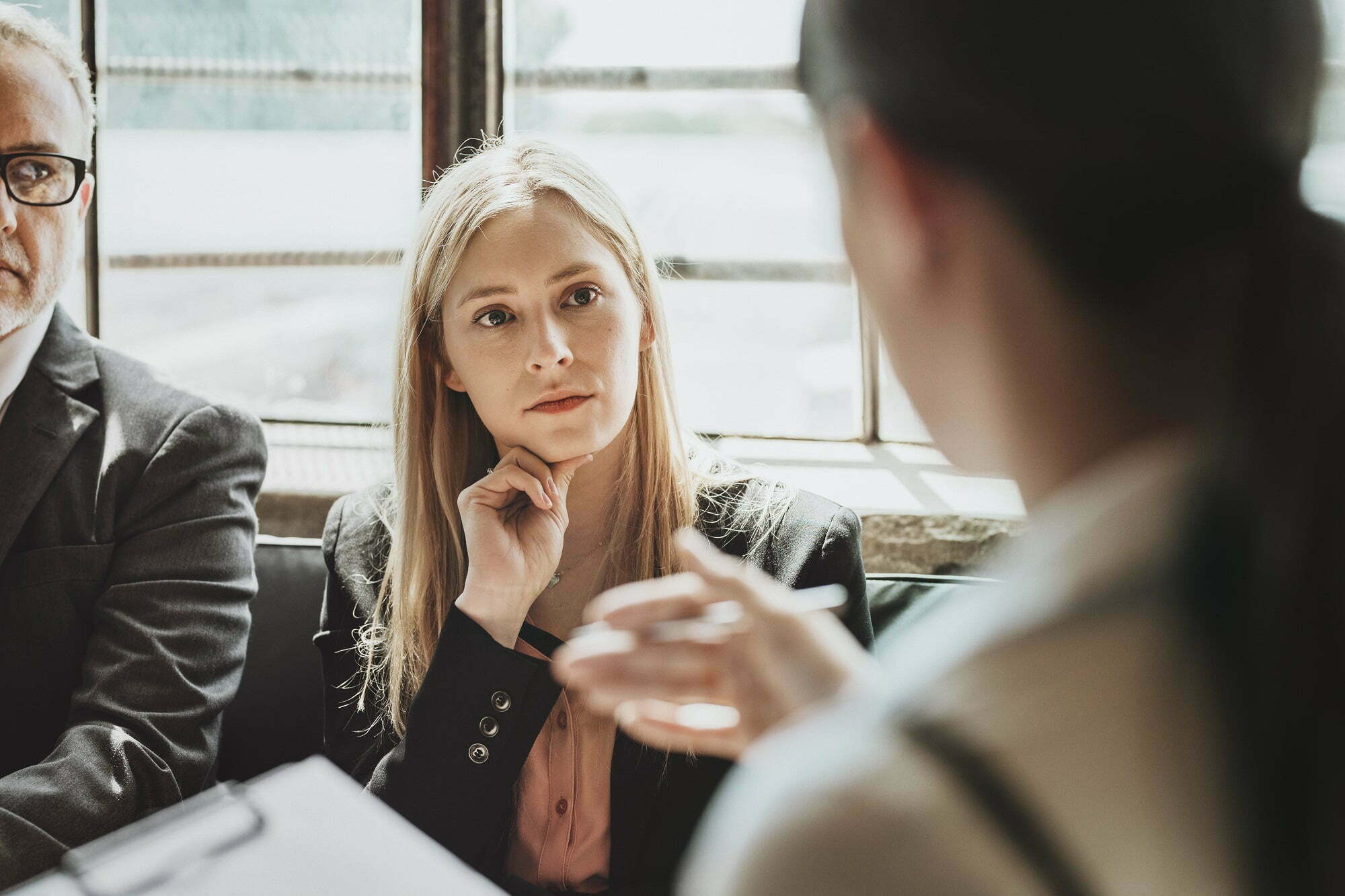 people in a meeting with therapist