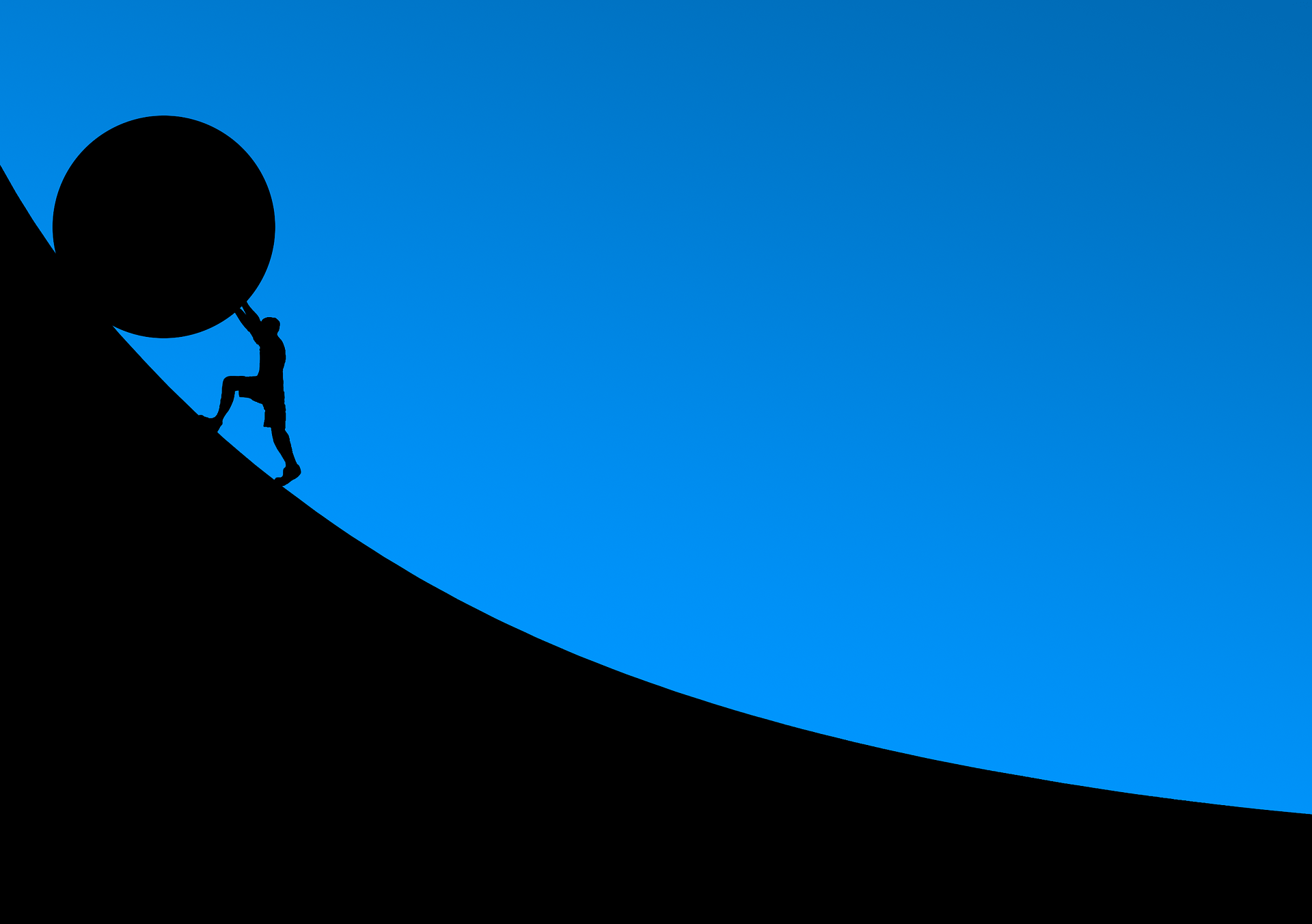 silhouette pushing boulder up hill