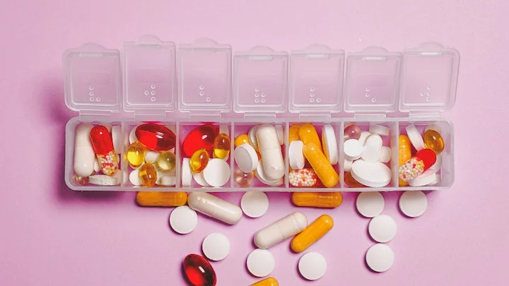 pill box filled with various pills