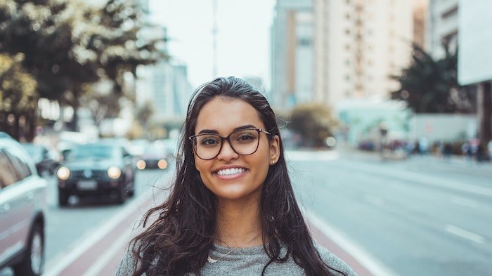 A woman smiling