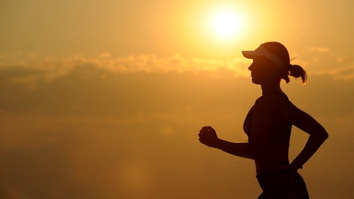 woman running in sunset