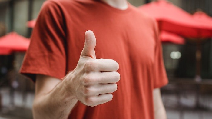 man with thumbs up