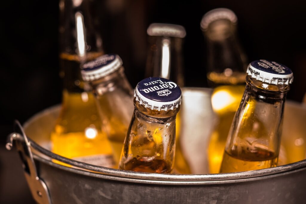 bottles of beer in an ice bucket