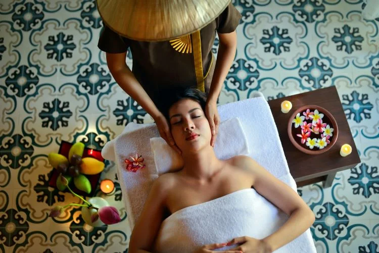A woman receiving Chinese medicine treatments