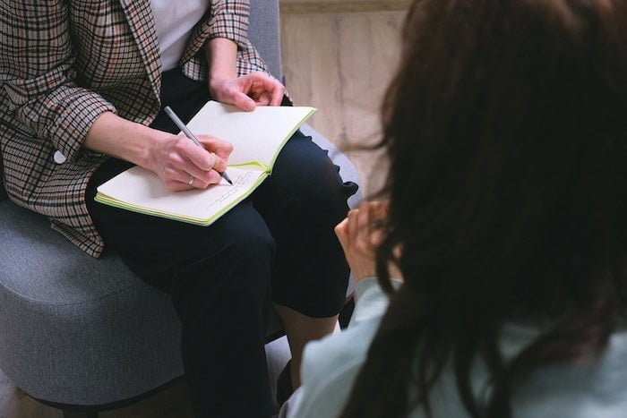 Therapist and patient taking notes about schizoaffective disorder