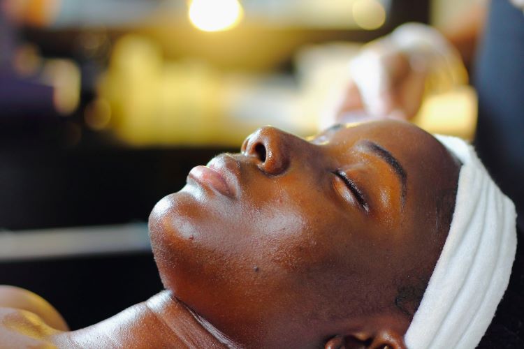 Woman getting ready for a massage holistic therapy for addiction at a drug and alcohol rehab clinic