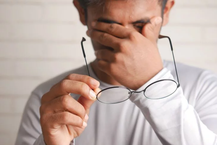 Exhausted person suffering from the consequences of gambling addiction