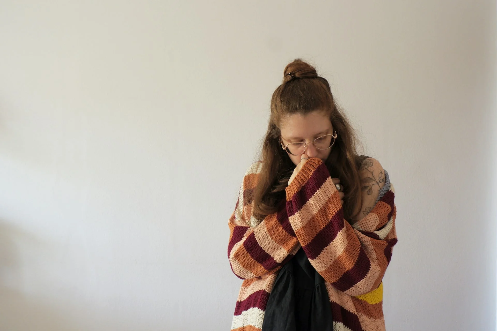 Woman looking unwell and thinking about alcohol poisoning