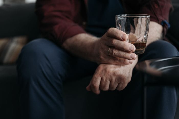 Someone suffering from an alcohol addiction on sertraline